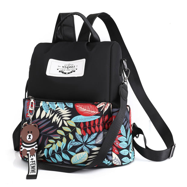Stylowy plecak damski w kwiatowy wzór - idealny dla studentek, z regulowanymi paskami i praktycznymi kieszeniami women bags Warschau Fashion Czarny