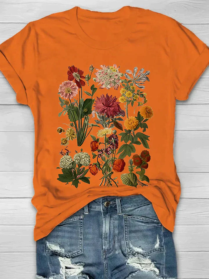Kobiecy T-shirt z krótkim rękawem i kwiatowym wzorem | Idealny na lato