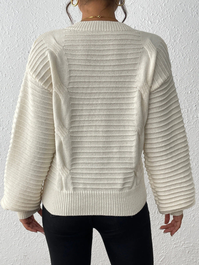 Fien | Elegancki sweter dzianinowy z warkoczowym wzorem sercowym i balonowymi rękawami Warschau Fashion